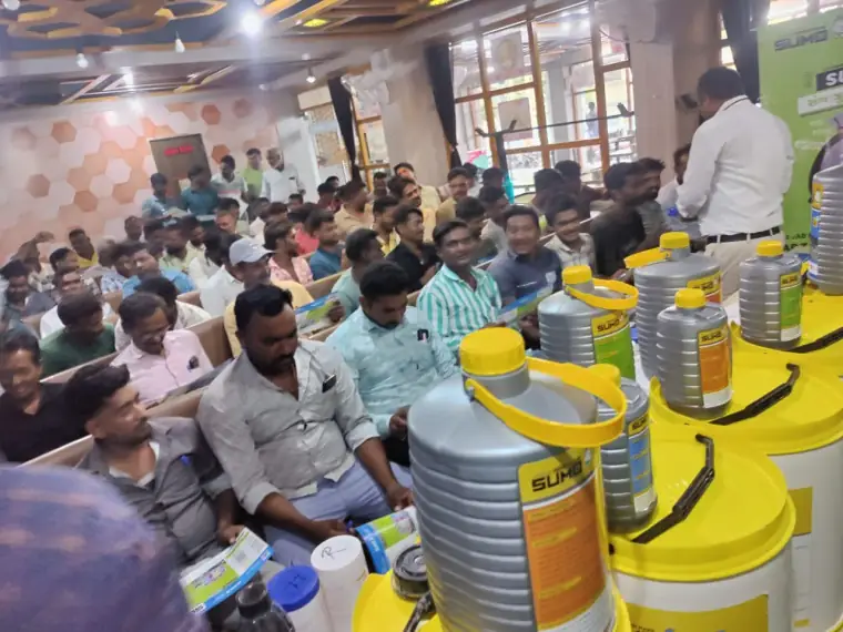 Packed hall at a SUMO contractor meet with SUMO products on display