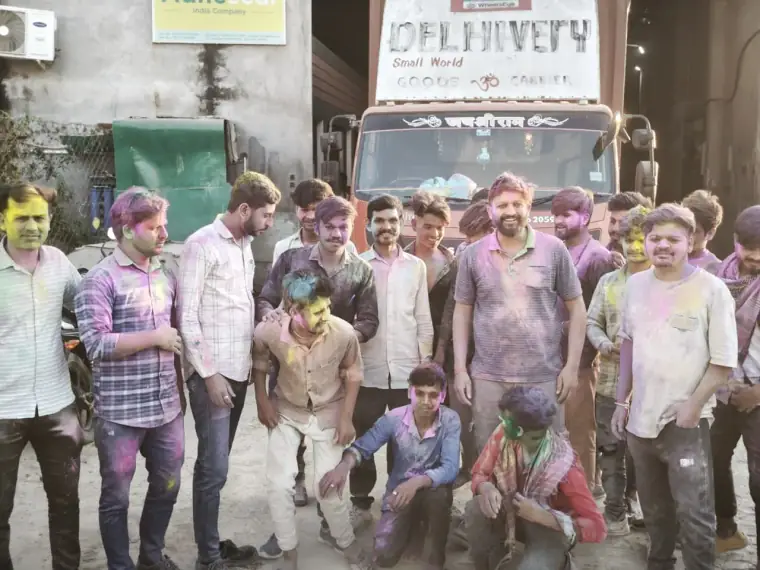 SUMO team group photo during Holi celebrations